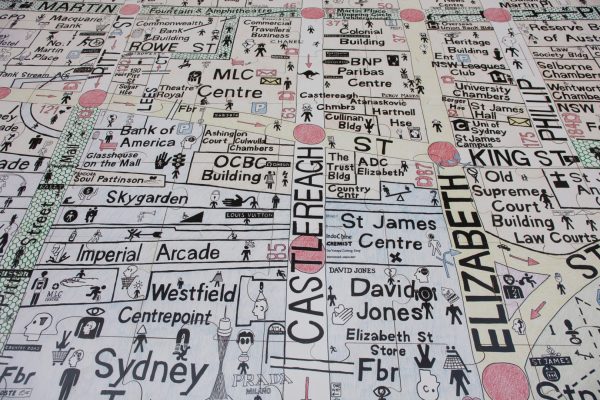 A hand-drawn street map of the Sydney CBD area, around Martin Place, Pitt Street and Centrepoint. The map is dotted with small, comical pictograms – showing human figures merging with icons of city life, including traffic lights, street signs and shopping trolleys.